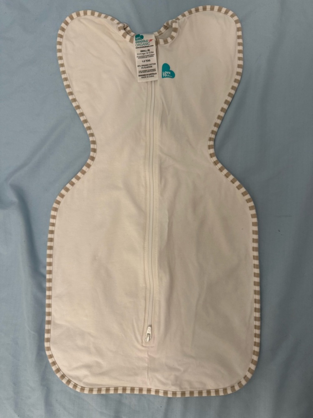 Love to Dream Organic White Swaddle with Beige Trim